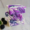 The Black Raspberry Vanila Plant-Based Soap Bar contains 25% shea butter, offering various skin-pampering advantages. Its delectable scent is a top choice among customers and adds a playful and lavish element to your everyday skincare routine.
